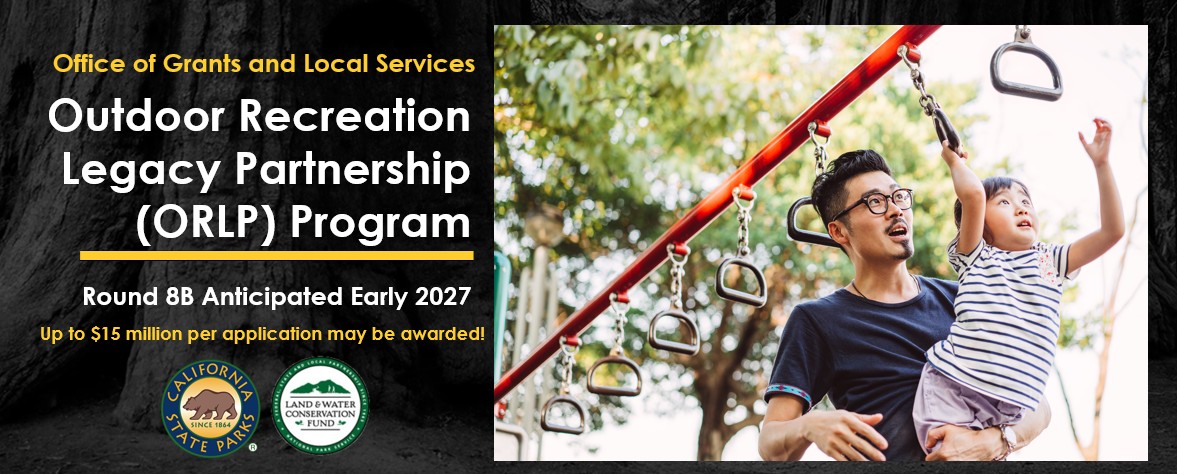  &ldquo;OGALS Outdoor Recreation legacy Partnership (ORLP) Program. Round 8B Anticipated Early 2027. Up to $15 Million per Application may be awarded.&rdquo; Photo of a man holding a toddler up to grab swing bars in a sunlit playground. 