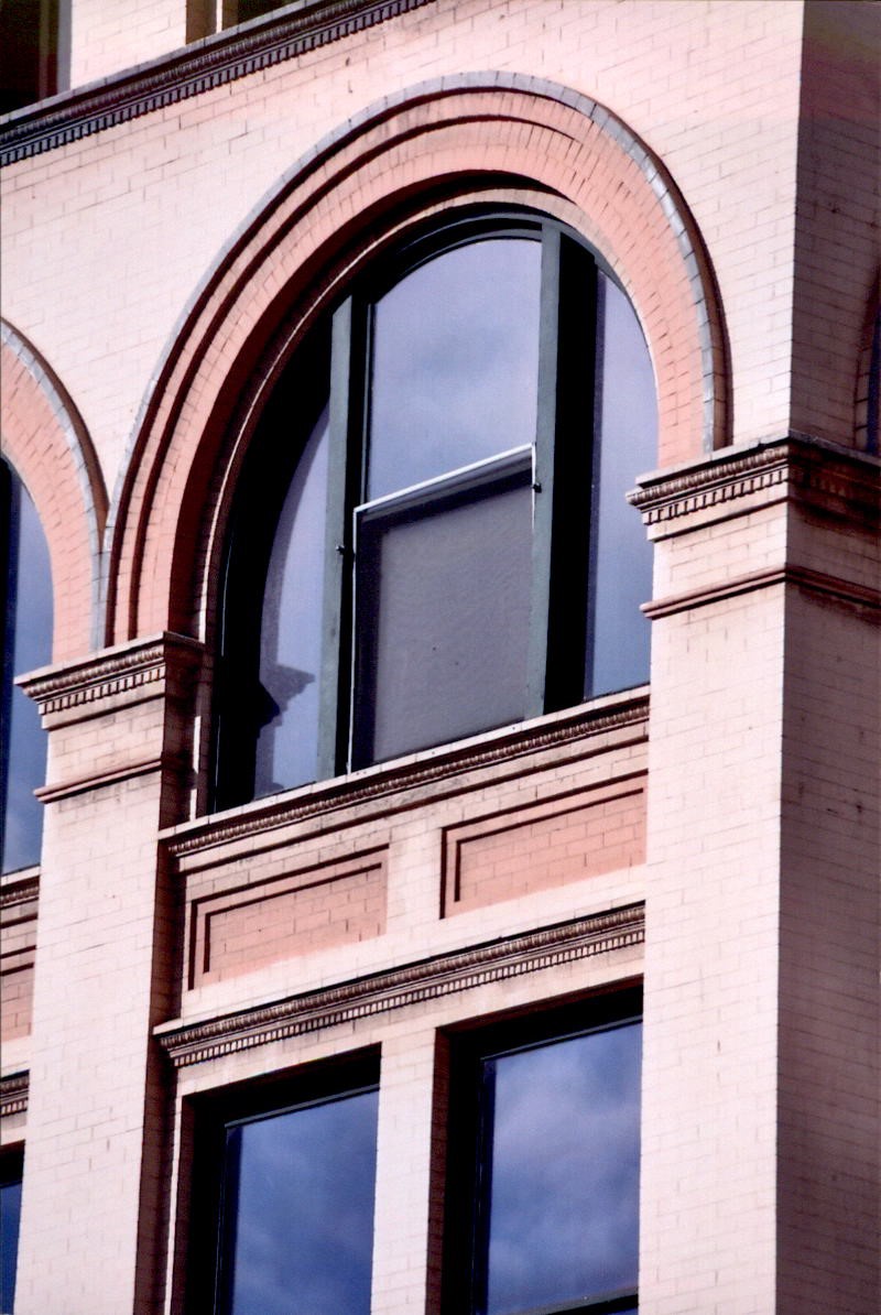 Fourth floor arched window detail