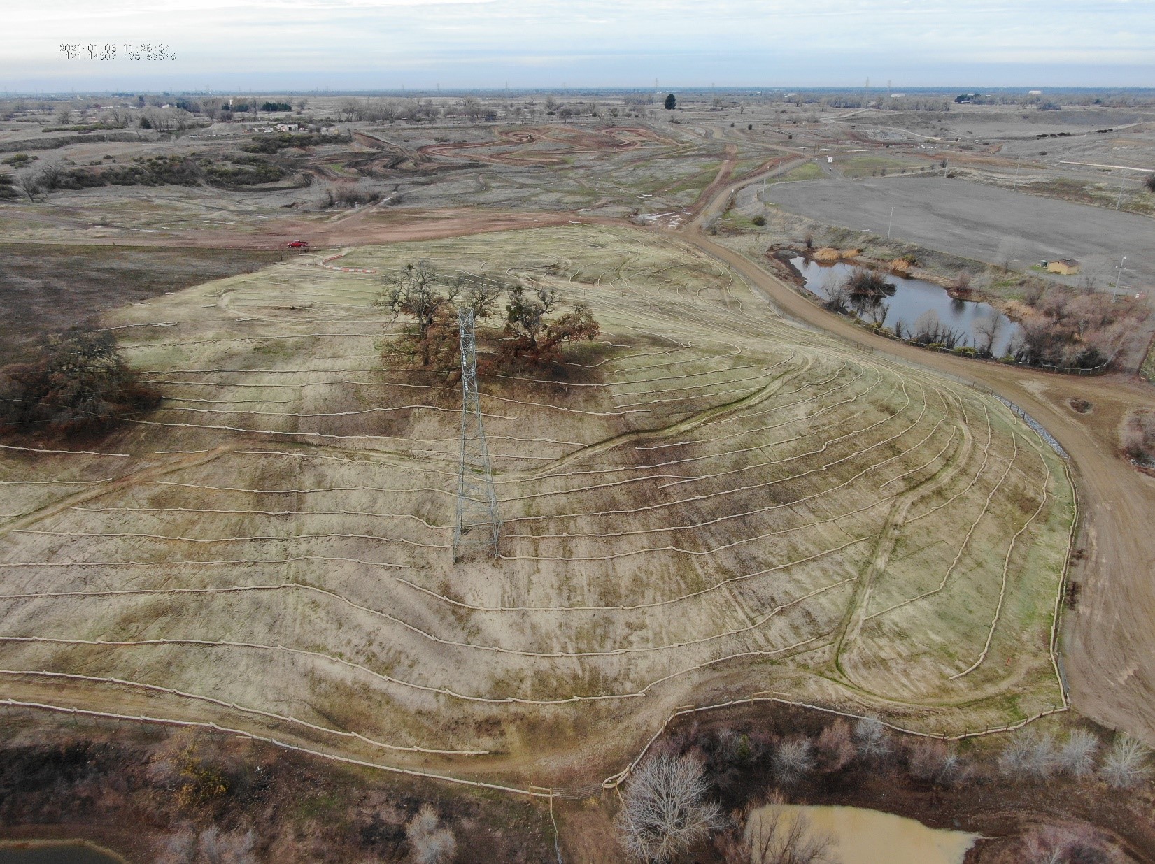 Fiber rolls were installed and native seed and wood mulch were applied to control erosion and improve wildlife habitat.