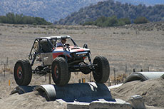 Off Road buggy on obstacle