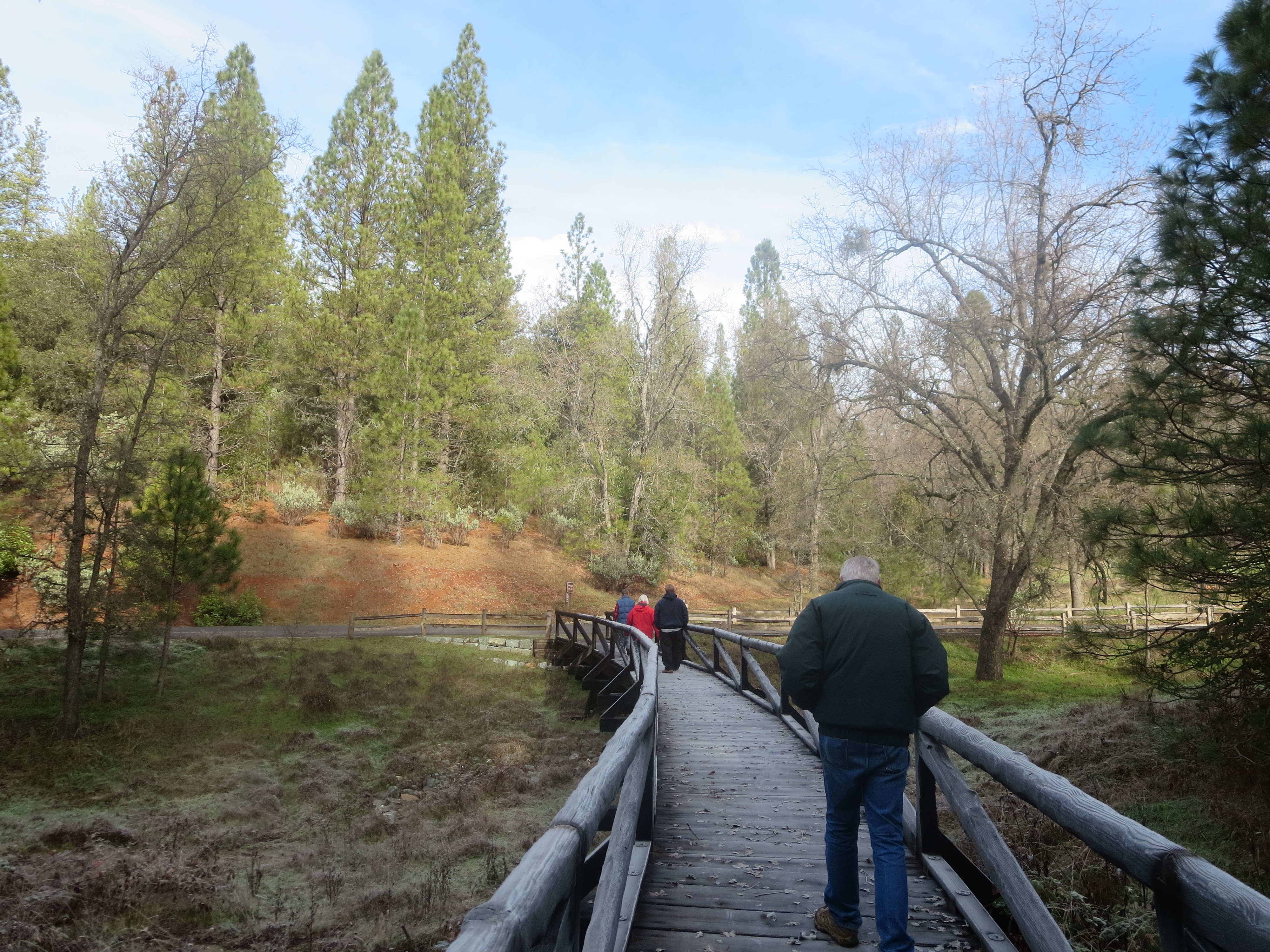 People walking over bridge at Indian Grinding Rock 