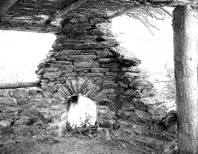 Fire in fireplace of shade ramada, April 1936