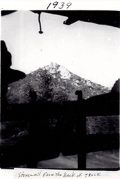 View of Stonewall Peak out of back of truck transporting CCC boys.