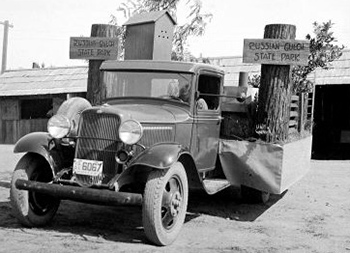 Parade float for 4th of July Parade: Russian Gulch State Park campsite reproduced on the back of a flatbed truck.