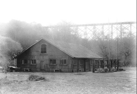 Russian Gulch recreation hall. Old highway bridge in background.