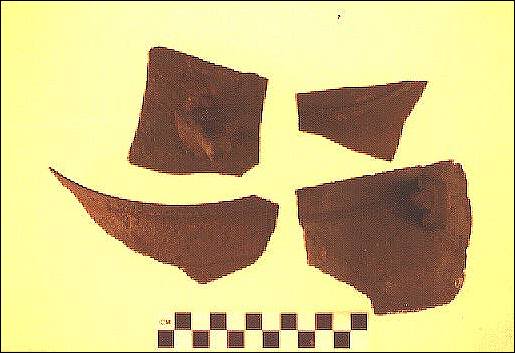 Pieces of a cast-iron pot