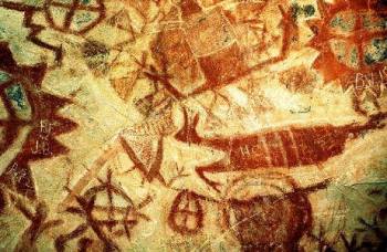 Detail of pictograph in Chumash Painted Cave, showing graffiti defacing original artwork.