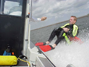 Lifeguard being "hot dropped" to a rescue on San Luis Reservoir.