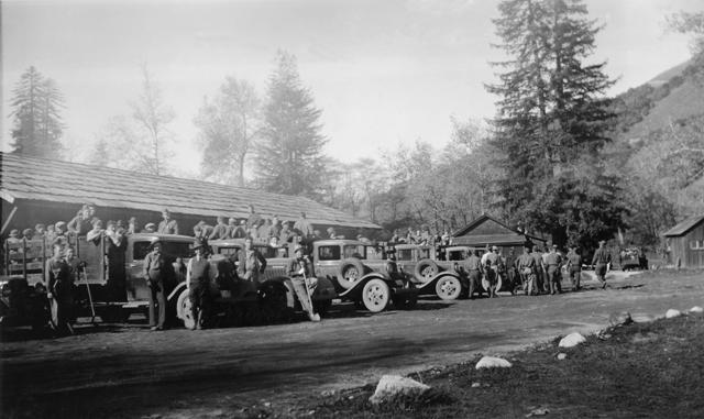 Camp Big Sur men and trucks in motor pool 1936