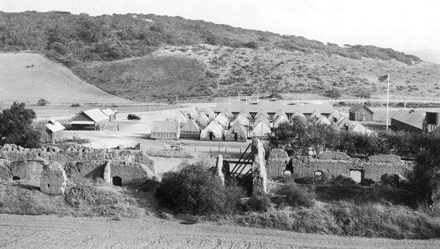 The CCC setting up camp at the La Purisima Mission in 1934 The camp tents can be seen behind the mission ruins.