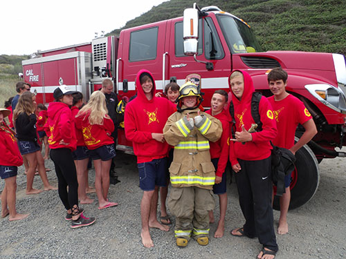 Image of JG's in front of fire truck