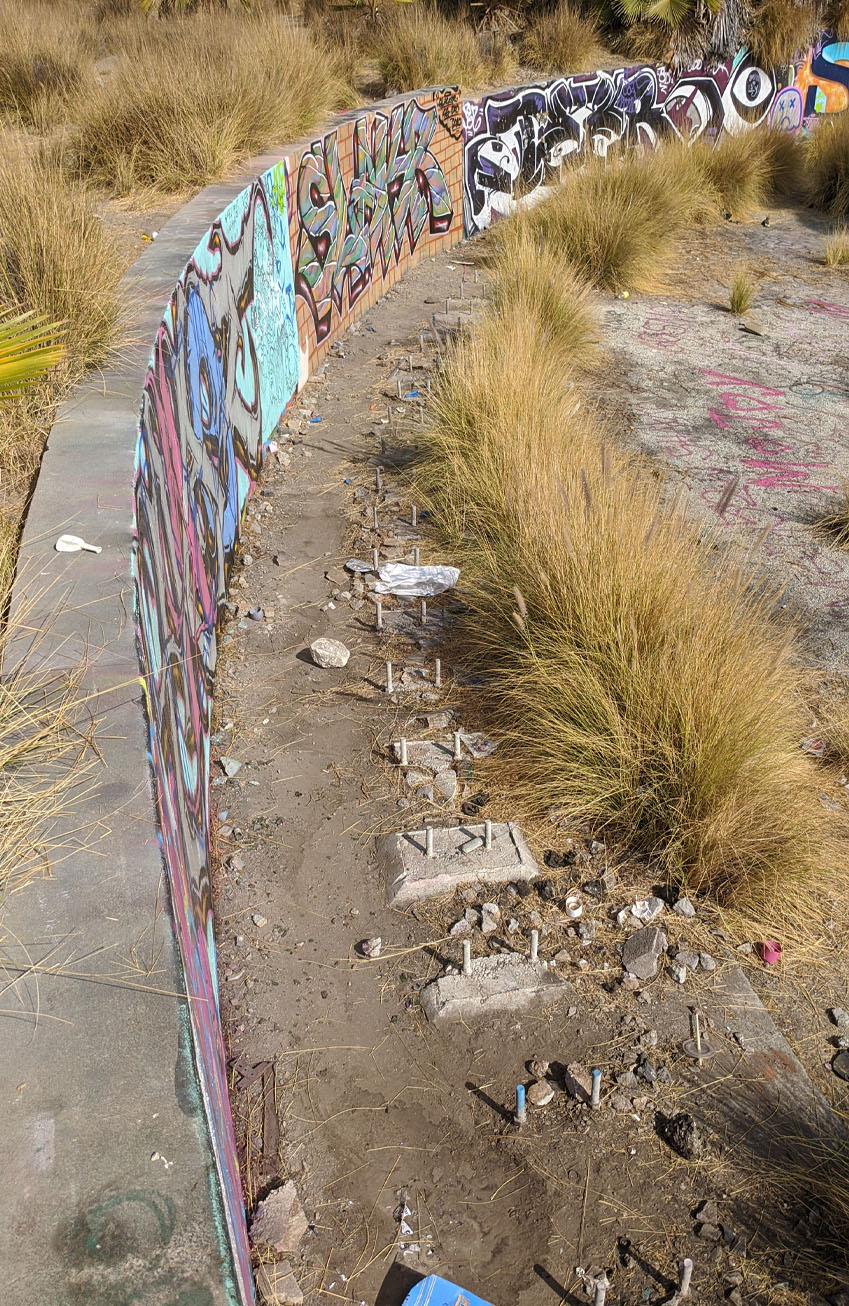 Remnants of a Taylor Yard railroad turntable pit with brightly painted walls Remnants of a Taylor Yard railroad turntable pit with brightly painted walls