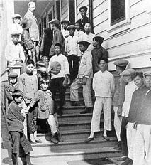 Immigrants waiting to be processed.