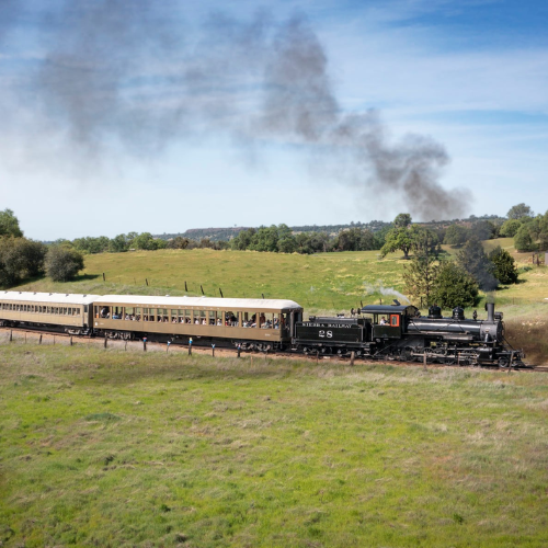 Train on tracks with smoke 