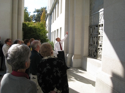Volunteer leading group tour