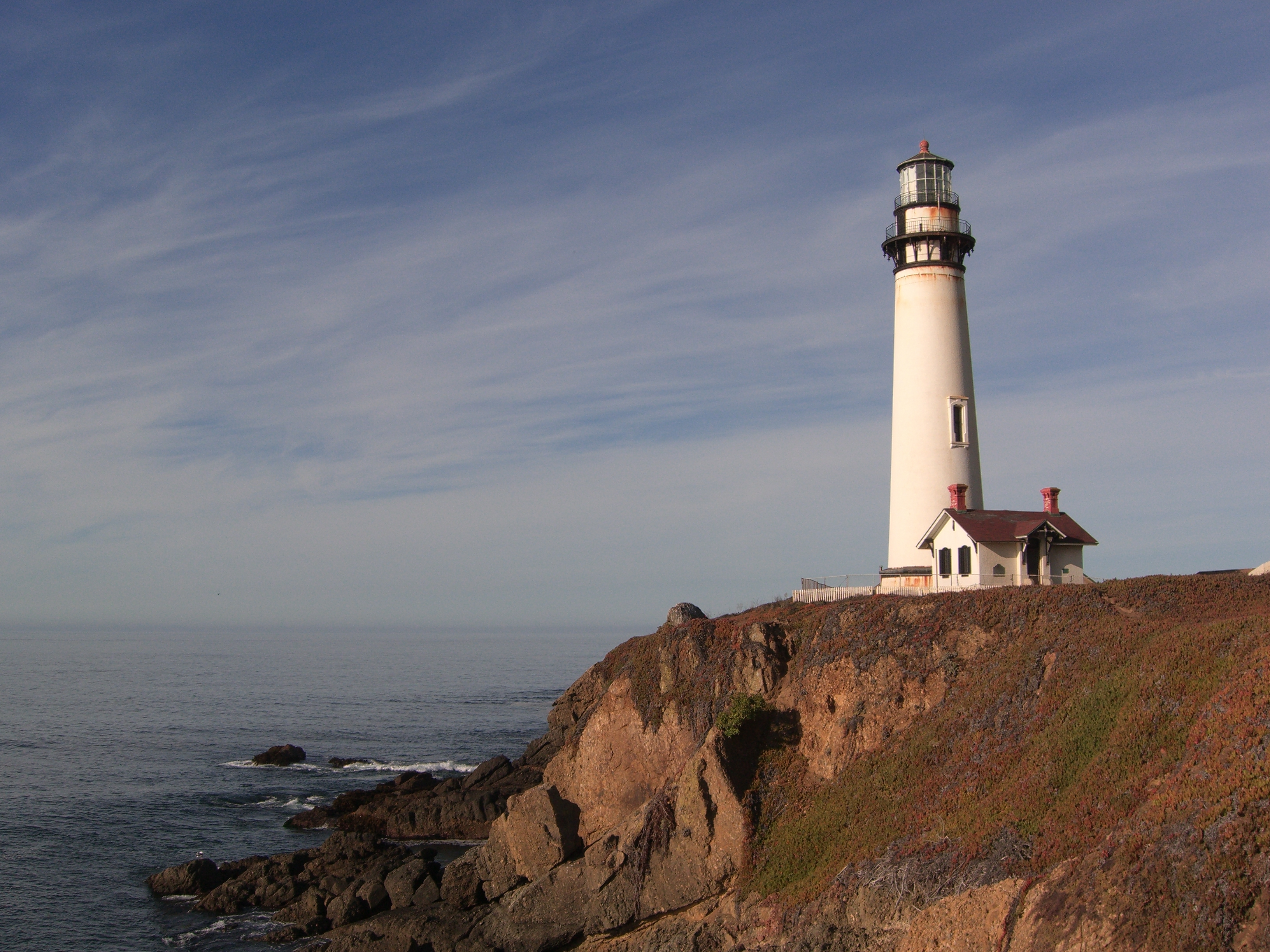 Pigeon Point Lighthouse on top of a bluff overlooking the ocean