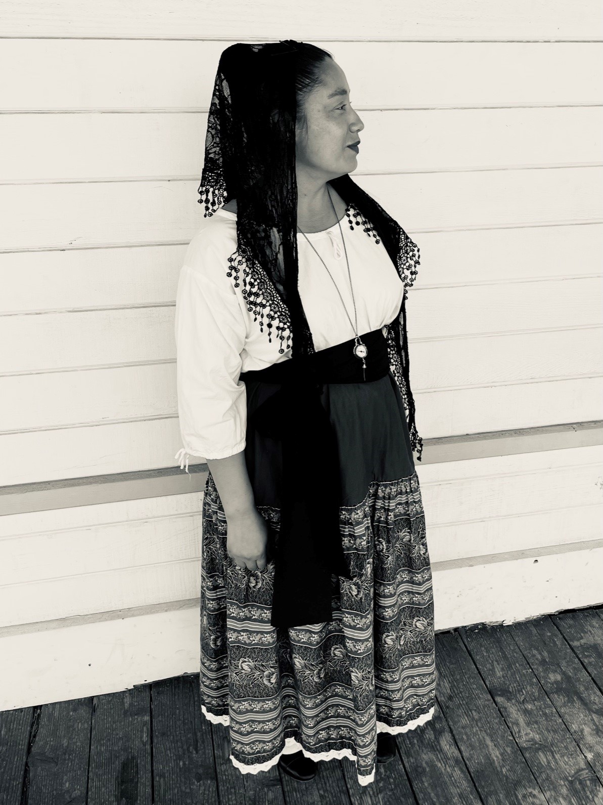 Black and White photo of a woman in historical Californio attire