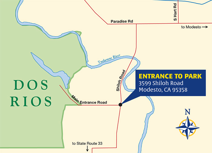 Navigation may take drivers to an area around the corner. Look for a white fence and a black ranch gate.