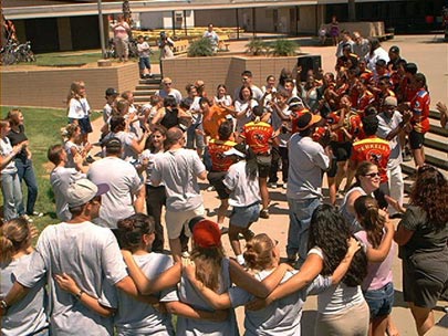 at camp and at the high school, getting awards and dancing with Santana High kids.
