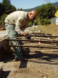 Parks worker welding
