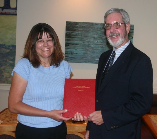 Renee Cannon presenting her Master's Thesis to Walter Gray.